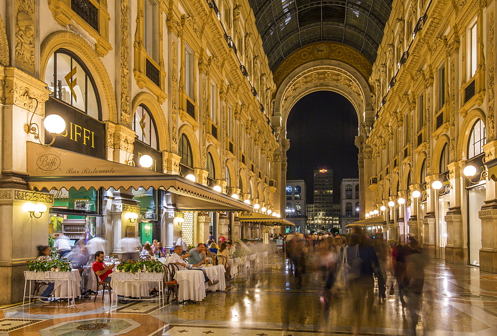 View of the interior of Galleria Vittorio Emanuele II illuminated at dusk, Milan, Lombardy, Italy, Europe