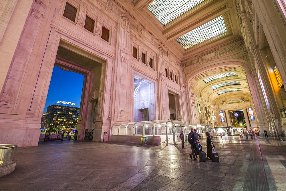 View of interior of Milan Central Station at dusk, Milan, Lombardy, Italy, Europe