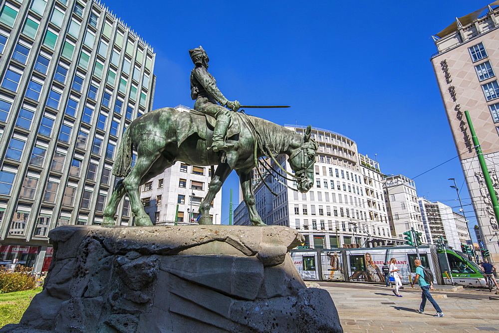 City tram and statue in Piazza Giuseppe Missori, Milan, Lombardy, Italy, Europe