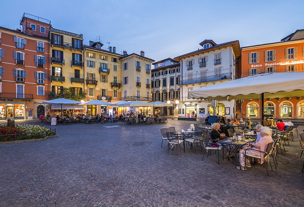 Al fresco restaurants in Piazza Daniele Ranzoni at dusk, Intra, Verbania, Province of Verbano-Cusio-Ossola, Lake Maggiore, Itallian Lakes, Italy, Europe