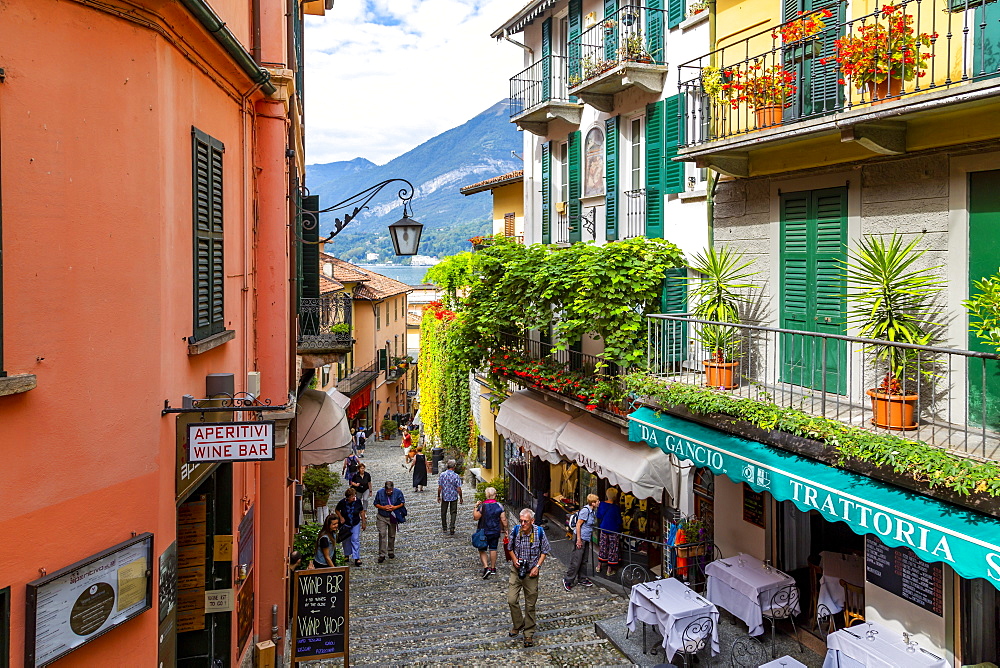 View of shops on cobbled street in Bellagio, Province of Como, Lake Como, Lombardy, Italian Lakes, Italy, Europe