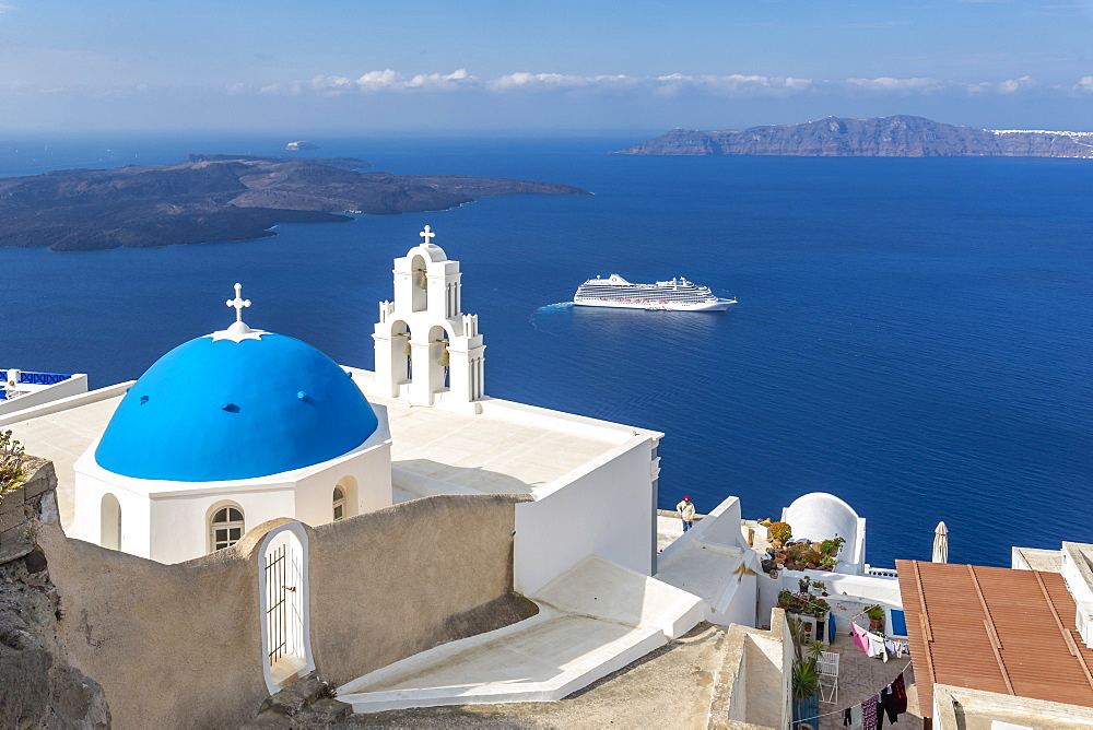 Blue dome and belltower of the church of St. Gerasimos, Firostefani, Fira, Santorini, Cyclades, Greek Islands, Greece, Europe