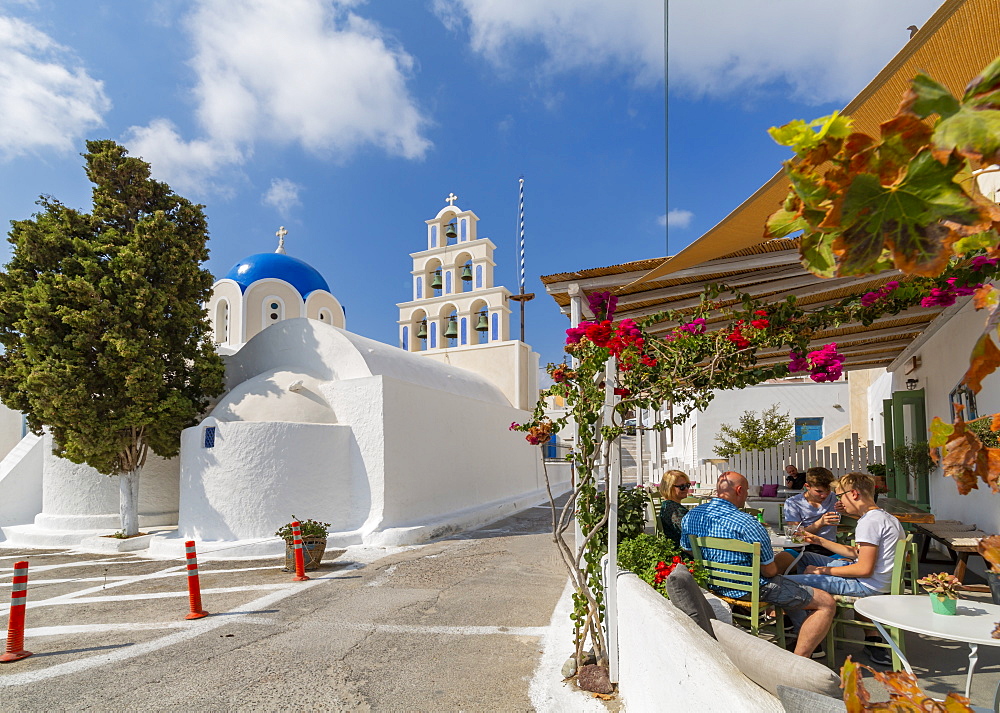 St. Epifanios Traditional Orthodox Church by restaurant in Akrotiri, Thira, Santorini, Cyclades Islands, Greece, Europe