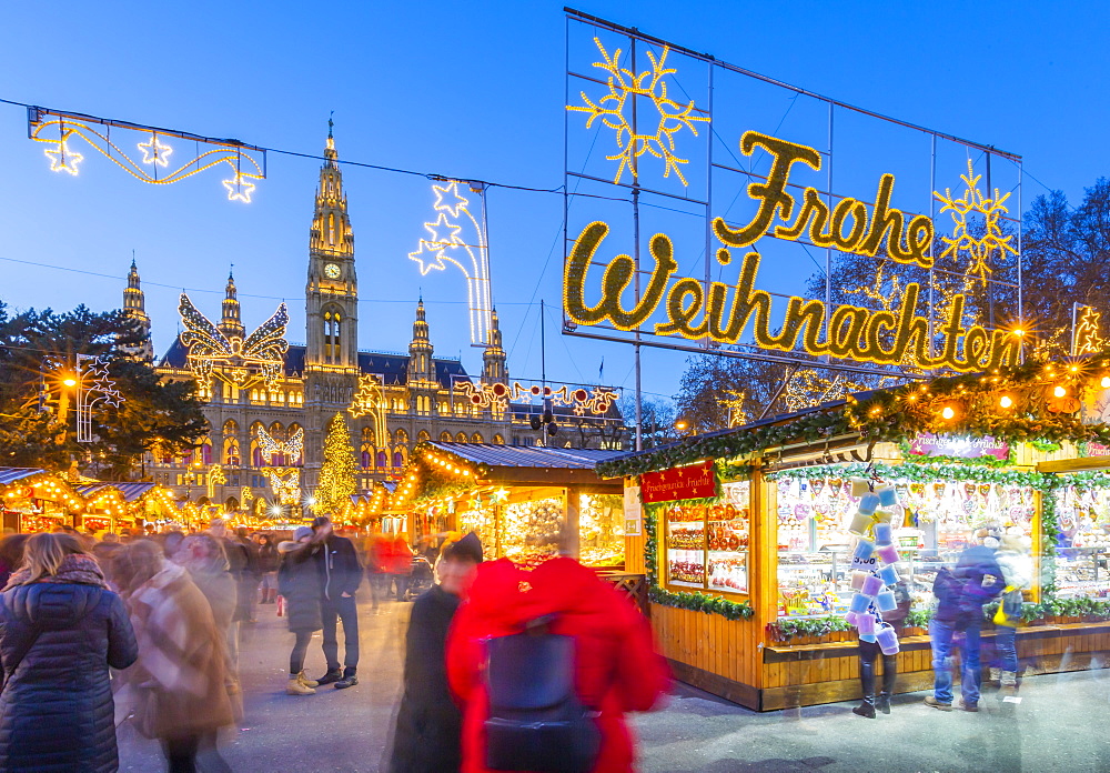 Rathaus and Christmas market stalls at night in Rathausplatz, Vienna, Austria, Europe