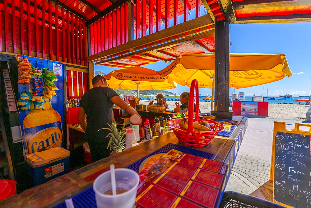 View of beach and Caribbean Sea from beach bar, Philipsburg, St. Maarten, Leeward Islands, West Indies, Caribbean, Central America