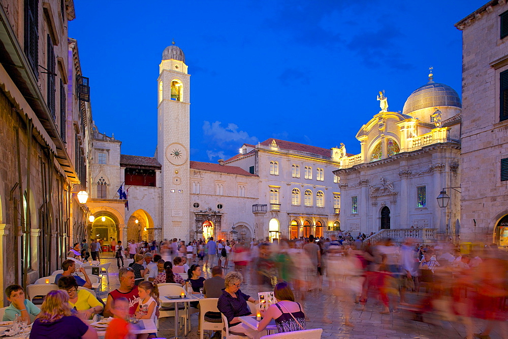 Clock tower and restaurants at dusk, Stradun, UNESCO World Heritage Site, Dubrovnik, Dalmatian Coast, Dalmatia, Croatia, Europe 