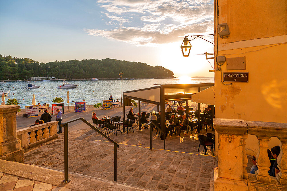 View of restaurant at sunset in Cavtat on the Adriatic Sea, Cavtat, Dubrovnik Riviera, Croatia, Europe