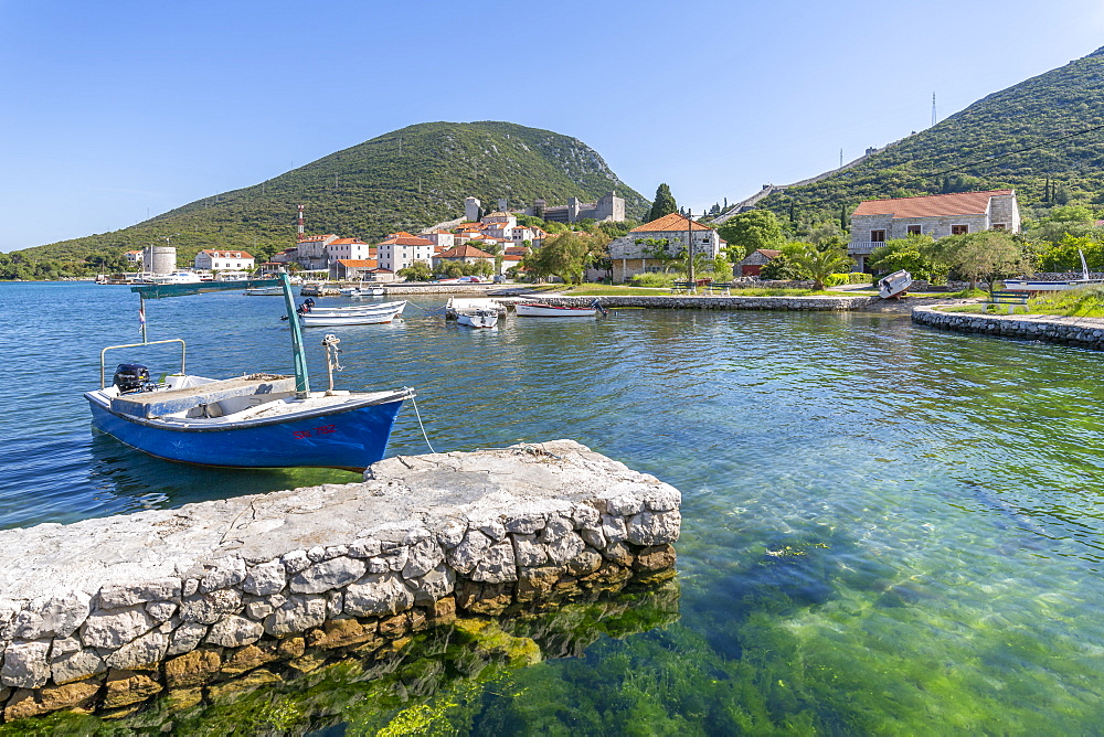 View of small harbour boats and restaurants in Mali Ston, Dubrovnik Riviera, Croatia, Europe