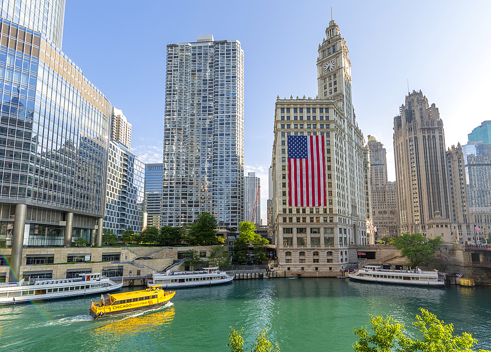 View of The Wrigley Building, Chicago River and watertaxi from DuSable Bridge, Chicago, Illinois, United States of America, North America