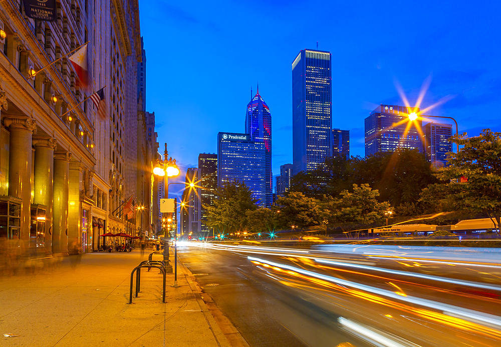 View of trail lights and skyscrapers on Michigan Avenue at dusk, Chicago, Illinois, United States of America, North America