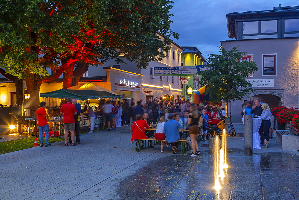 View of people enjoying nightlife in Radstadt, Styria, Austrian Tyrol, Austria, Europe