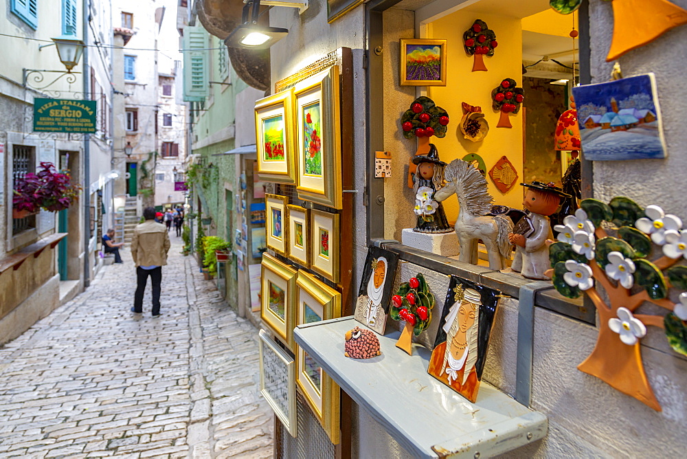 View of local souvenirs on cobbled street in the old town, Rovinj, Istria, Croatia, Adriatic, Europe