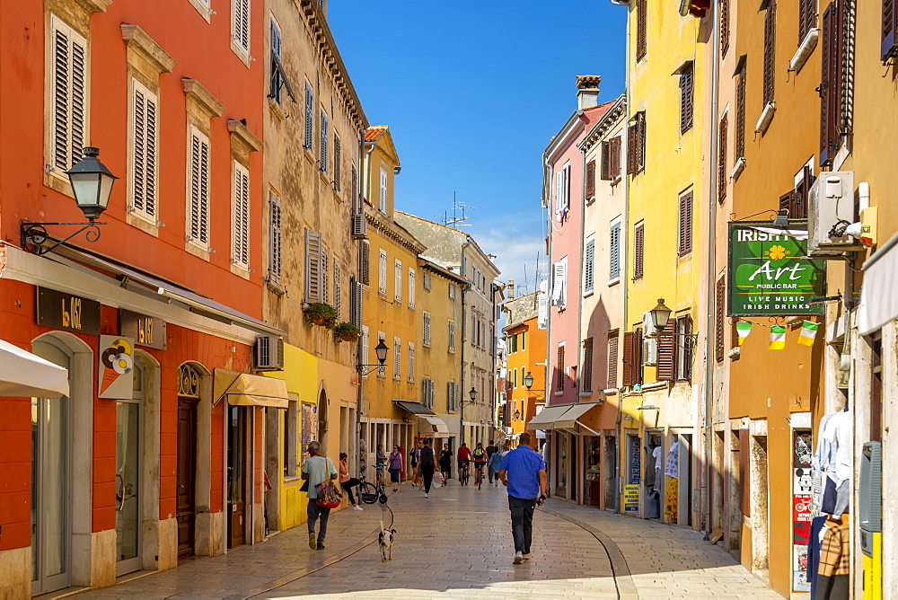 View of shops and people in colourful old town, Rovinj, Istria, Croatia, Adriatic, Europe