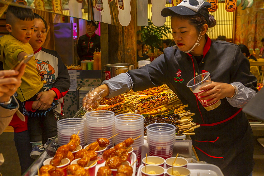 Street food in Kuanxiangzi Alley, Chengdu, Sichuan Province, People's Republic of China, Asia