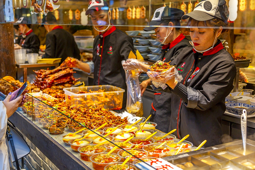 Street food in Kuanxiangzi Alley, Chengdu, Sichuan Province, People's Republic of China, Asia