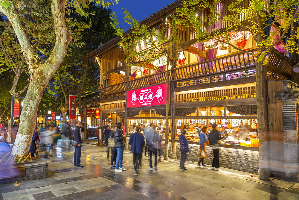 Shoppers in Kuanxiangzi Alley at night, Chengdu, Sichuan Province, People's Republic of China, Asia