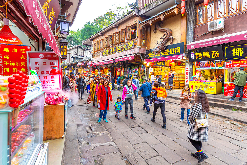 Busy shopping street in Ciqikou Old Town, Shapingba, Chongqing, China, Asia