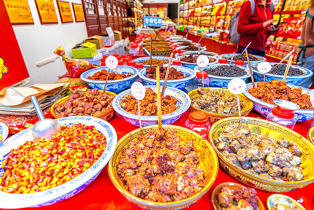 Local delicacies on display in Ciqikou Old Town, Shapingba, Chongqing, China, Asia