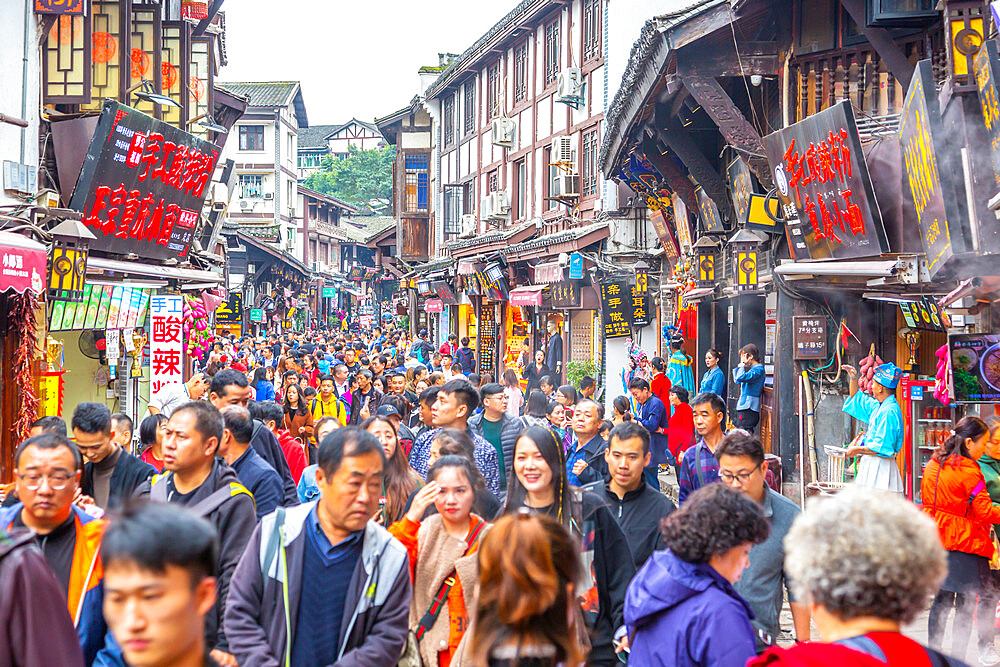 Busy shopping street in Ciqikou Old Town, Shapingba, Chongqing, China, Asia