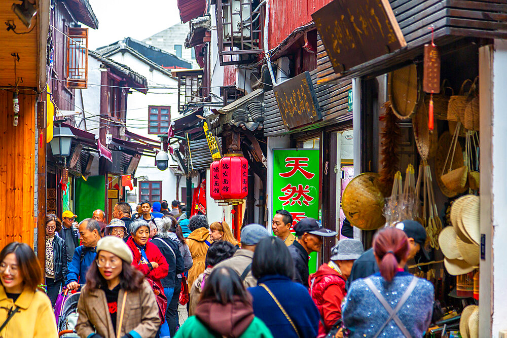 View of busy shopping street in Zhujiajiaozhen water town, Qingpu District, Shanghai, China, Asia