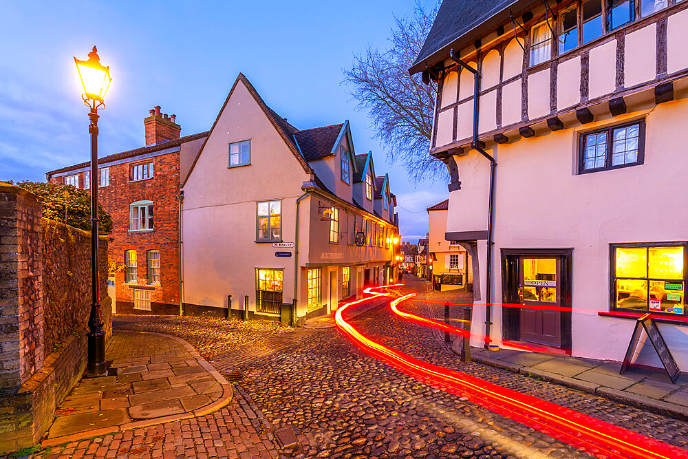 View of Elm Hill cobbled street and architecture at dusk, Norwich, Norfolk, England, United Kingdom, Europe