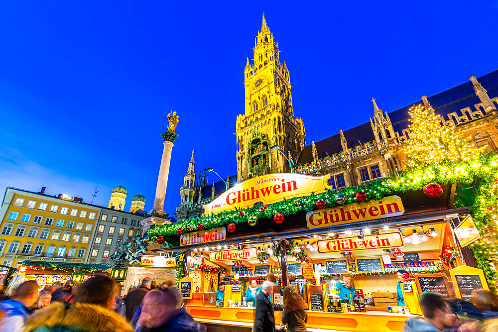 View of Christmas Market in Marienplatz and New Town Hall at dusk, Munich, Bavaria, Germany, Europe