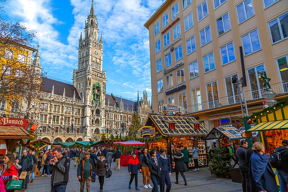 View of the New Town Hall clock tower (Rathaus) and Christmas Market in Marienplatz, Munich, Bavaria, Germany, Europe