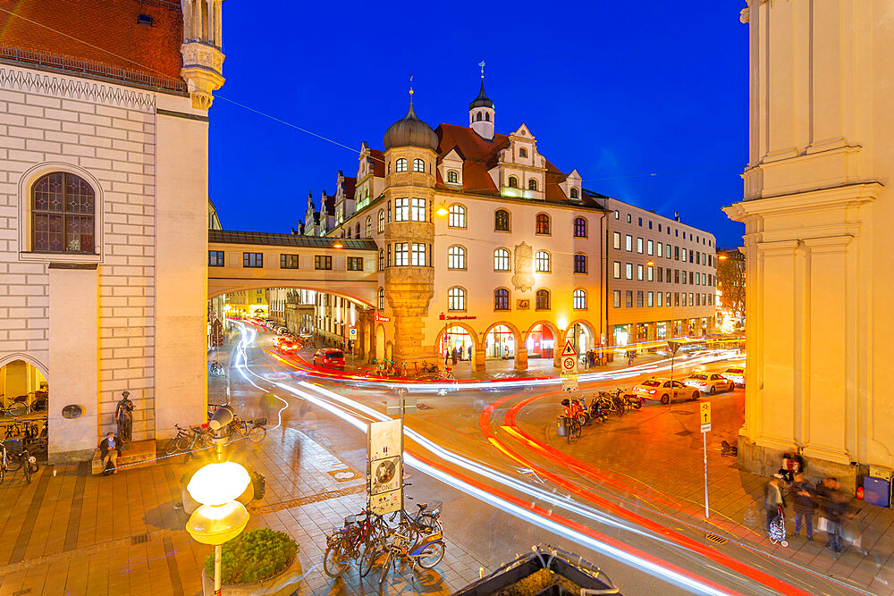 View of trail lights on street near Old Town Hall at dusk, Munich, Bavaria, Germany, Europe