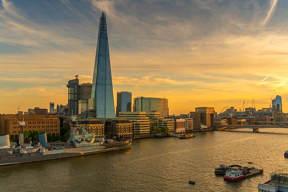 View of The Shard, HMS Belfast and River Thames from Cheval Three Quays at sunset, London, England, United Kingdom, Europe