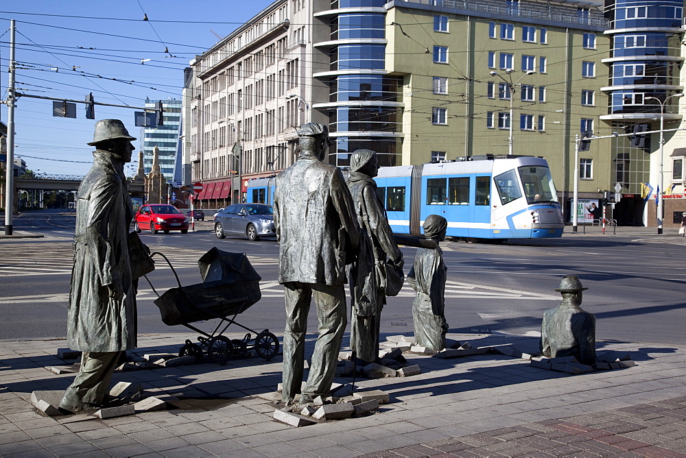 Memorial statues and tram, Old Town, Wroclaw, Silesia, Poland, Europe