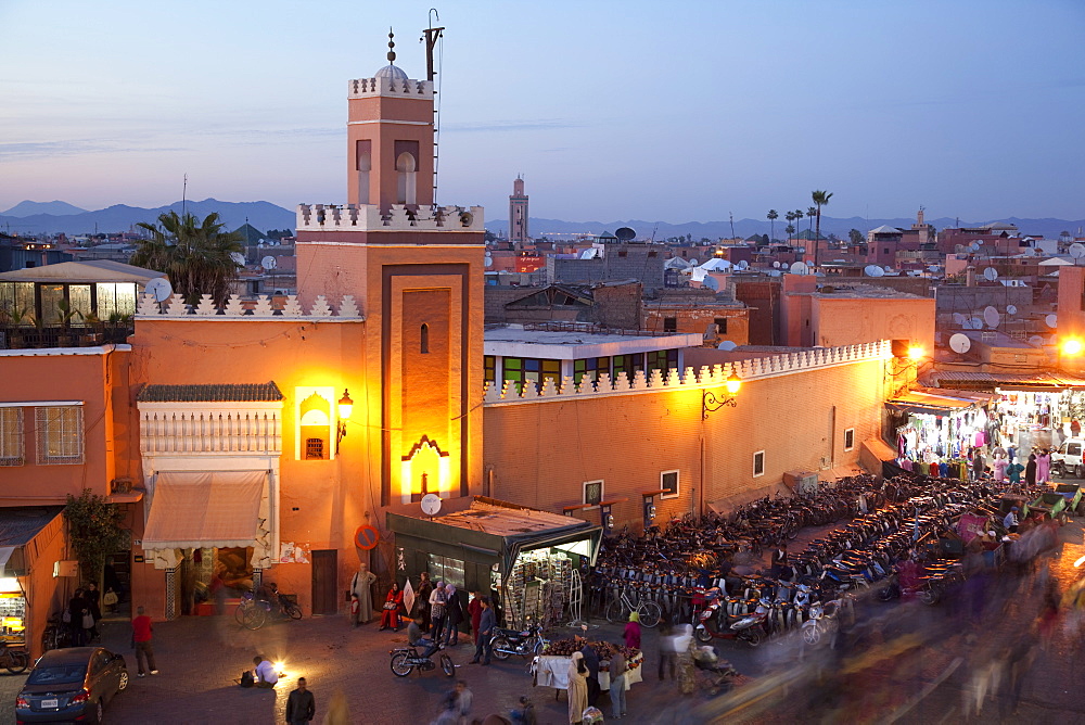 Mosque at dusk, Place Jemaa El Fna, Marrakesh, Morocco, North Africa, Africa