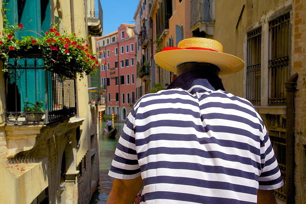 Canal and gondolier, Venice, Veneto, Italy, Europe