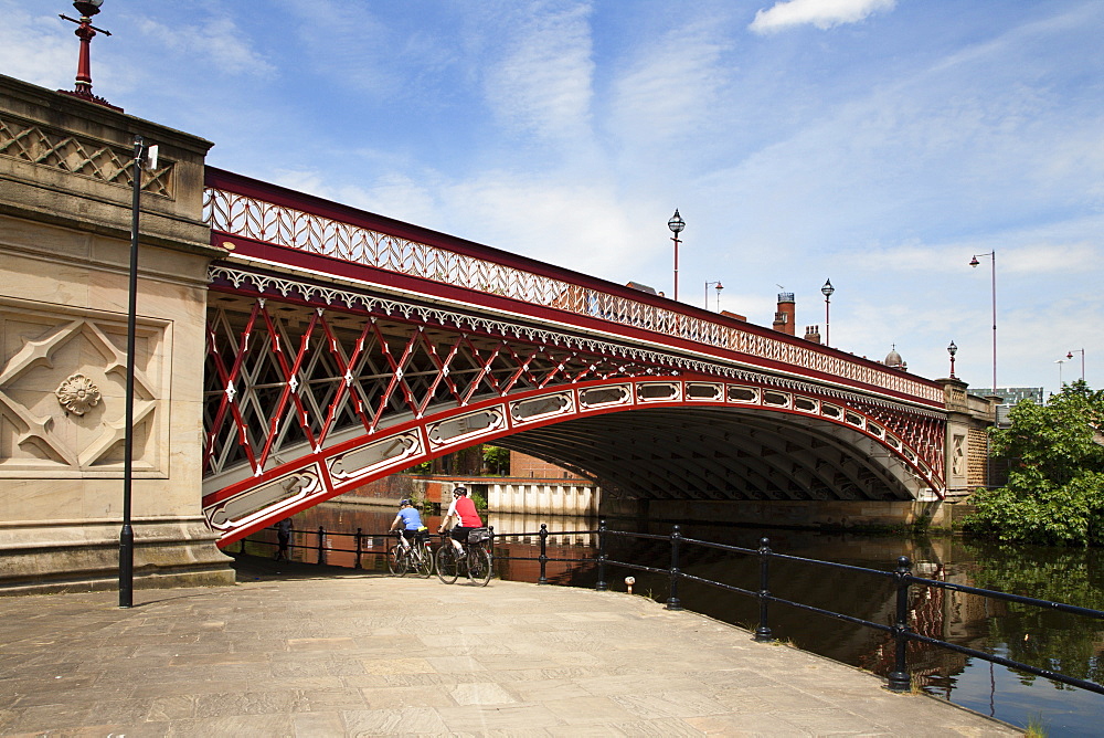 Cyclists by the River Aire at Crown Point Bridge, Leeds, West Yorkshire, Yorkshire, England, United Kingdom, Europe