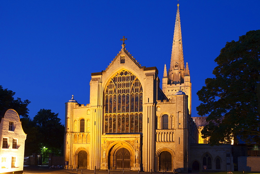 Norwich Cathedral floodlit at dusk, Norwich, Norfolk, England, United Kingdom, Europe