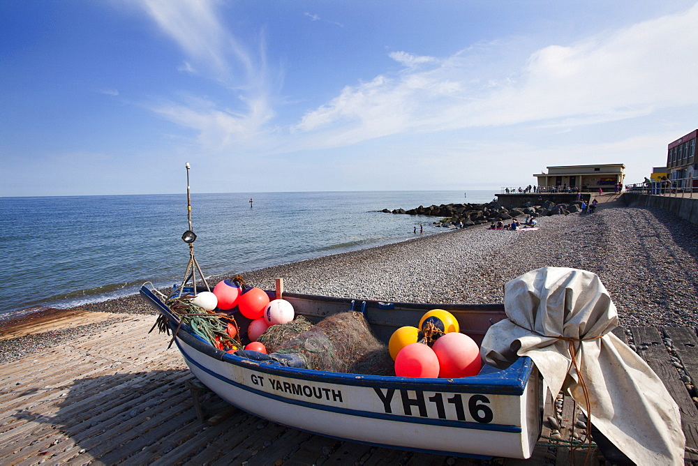 Fishing boat on the shingle beach at Sheringham, Norfolk, England, United Kingdom, Europe