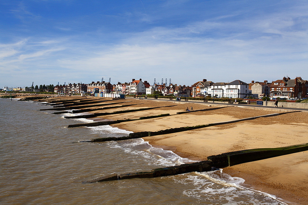 Felixstowe Beach from the pier with Container Port cranes in the distance, Felixstowe, Suffolk, England, United Kingdom, Europe 