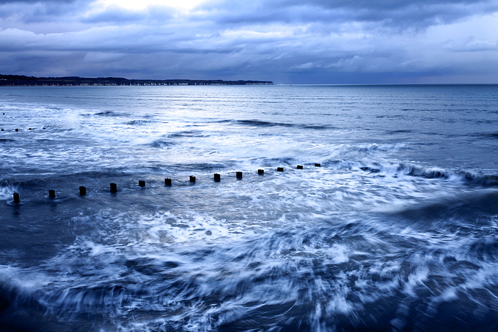 Toward Flamborough Head from Bridlington Harbour at dusk, East Riding of Yorkshire, England, United Kingdom, Europe