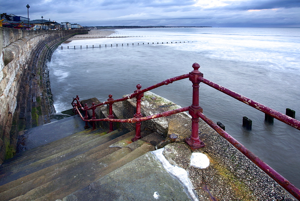 Sea steps and incoming tide at North Sands, Bridlington, East Riding of Yorkshire, England, United Kingdom, Europe