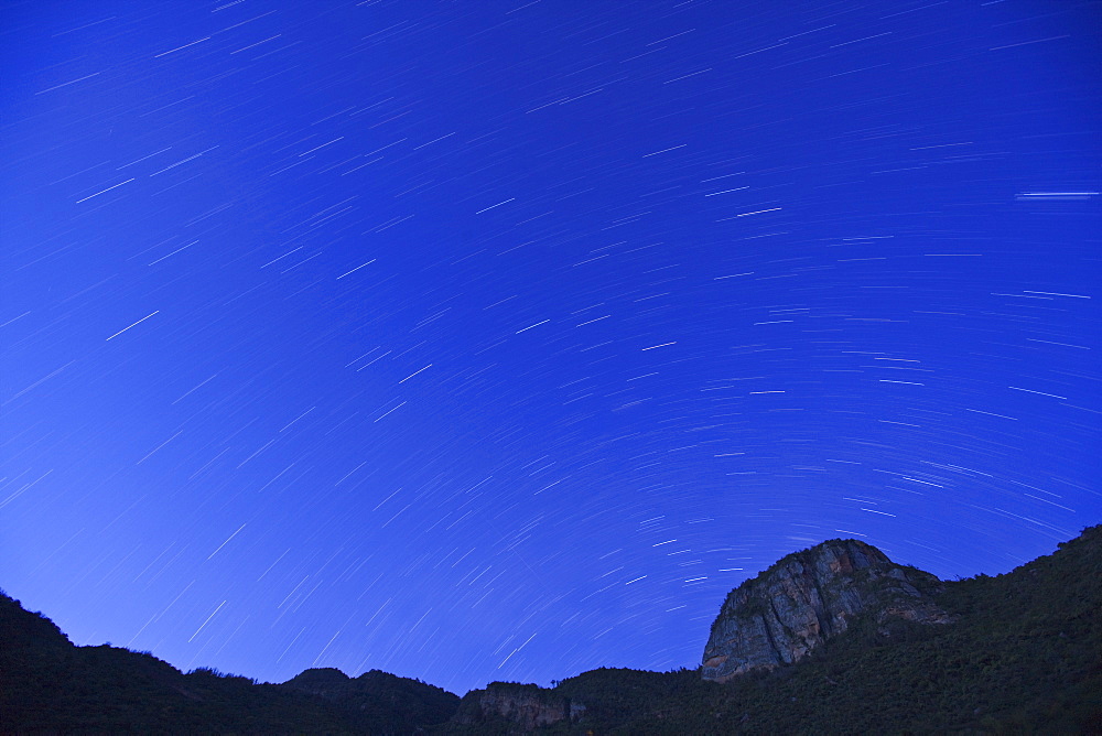 Star trails at dusk above Mount Nyiru, Northern Frontier, Kenya, East Africa, Africa