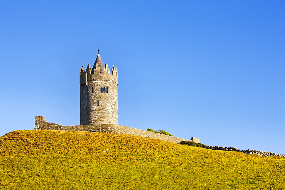 Doonagore Castle between the village of Doolin and the Cliffs of Moher on the County Clare coast, County Clare, Munster, Republic of Ireland, Europe