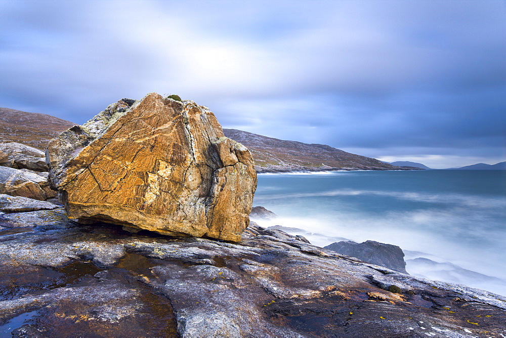 Giant Lewisian gneiss rock on a showery evening at Mealista on the south west coast of Lewis, Isle of Lewis, Outer Hebrides, Scotland, United Kingdom, Europe