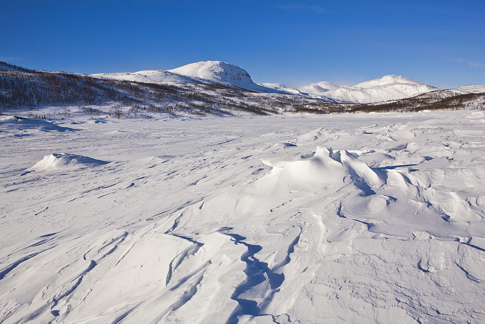 Sastrugi snow patterns in Mosstrond, near the Hardanger Plateau, Norway, Scandinavia, Europe