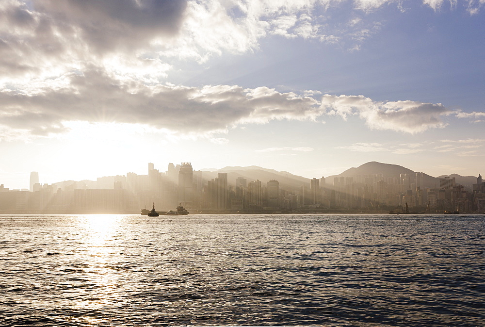 Dawn over Hong Kong Central skyline, Avenue of Stars, Tsim Sha Tsui Waterfront, Kowloon, Hong Kong, China, Asia