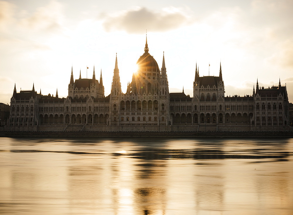 Sunrise behind the Hungarian Parliament Building and Danube River, Budapest, Hungary, Europe