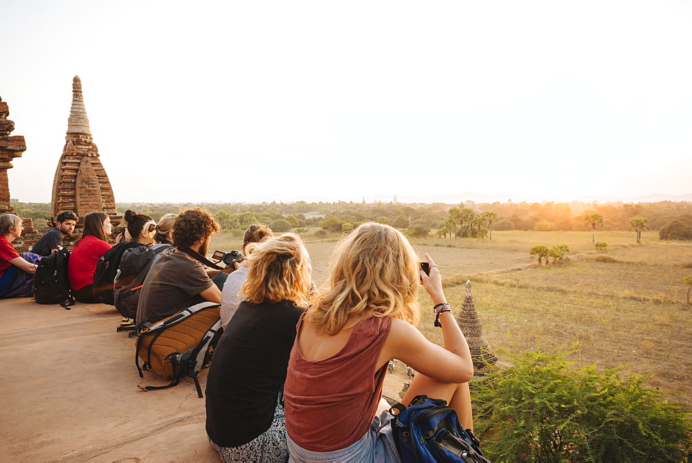 Tourists enjoying the sunset from Temple, Bagan (Pagan), Mandalay Region, Myanmar (Burma), Asia