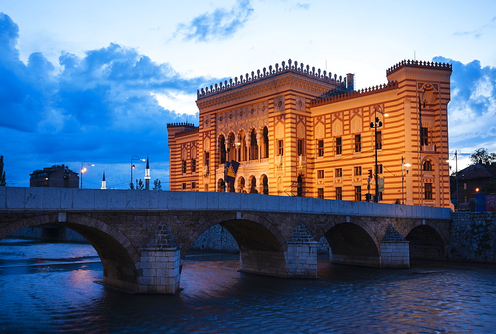 Exterior of Vijecnica (City Hall) at dusk, Old Town, Sarajevo, Bosnia and Hercegovina