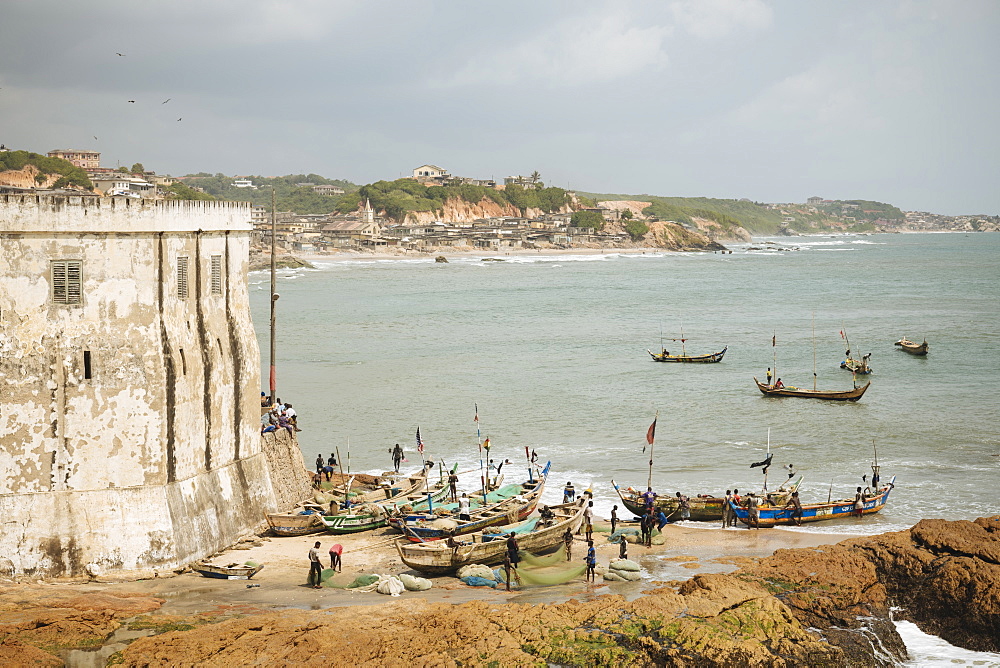 Fishermen preparing boats at Cape Coast Castle, Cape Coast, Ghana, Africa