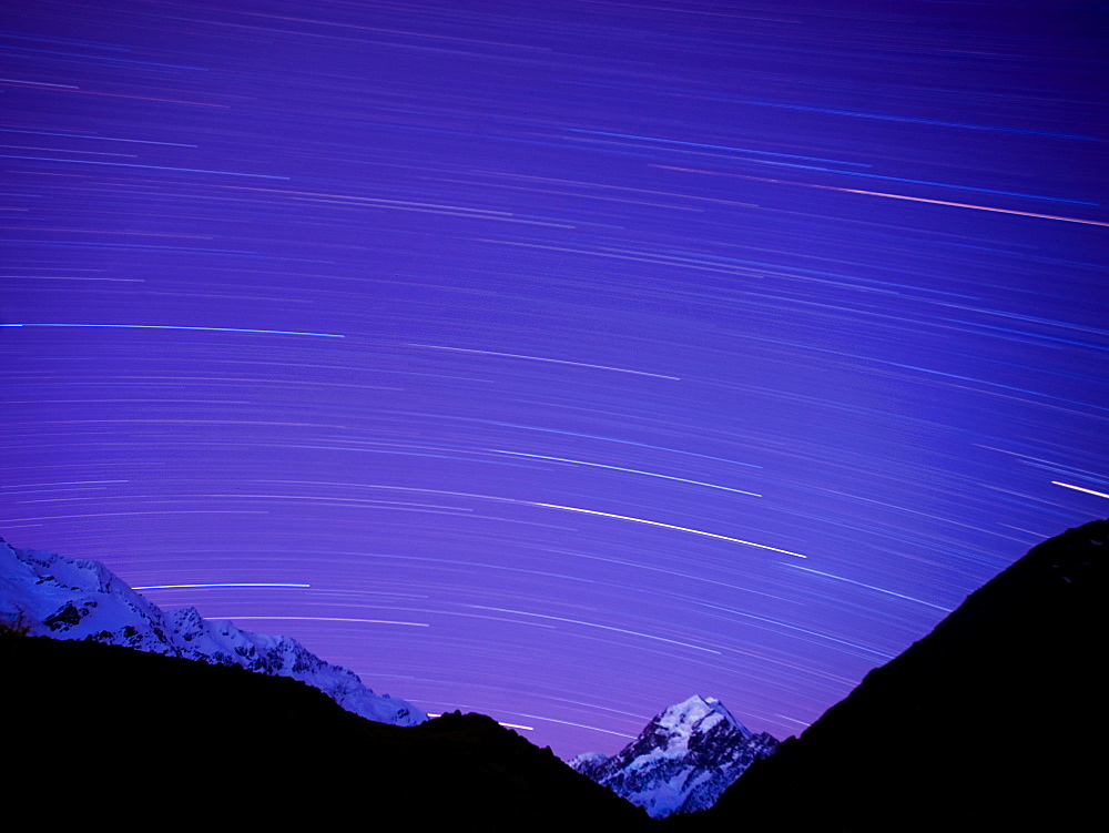 Long exposure of night sky over Aoraki Mount Cook National Park, UNESCO World Heritage Site, South Island, New Zealand, Pacific