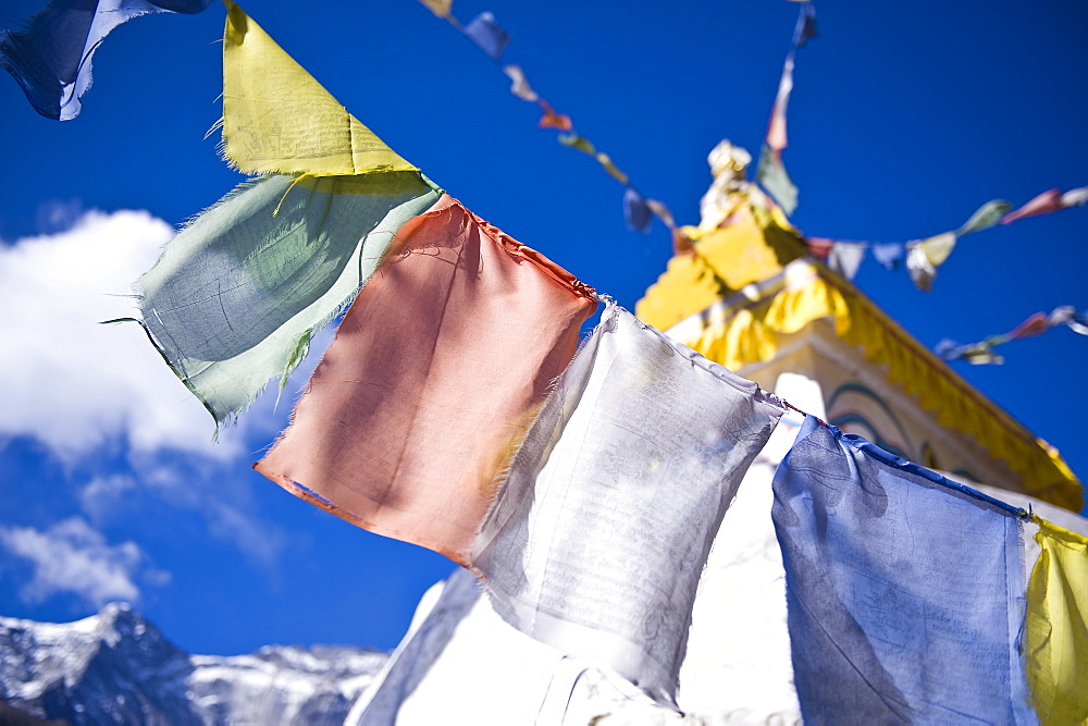 Prayer flags and Buddhist stupa, Namche Bazaar, Solu Khumbu Region, Nepal, Himalayas, Asia