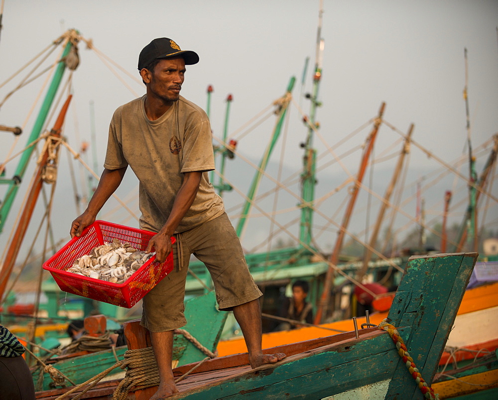 Dawn at Kampot Harbour as fishing boats return with night's catch, Kampot Province, Cambodia, Indochina, Southeast Asia, Asia 